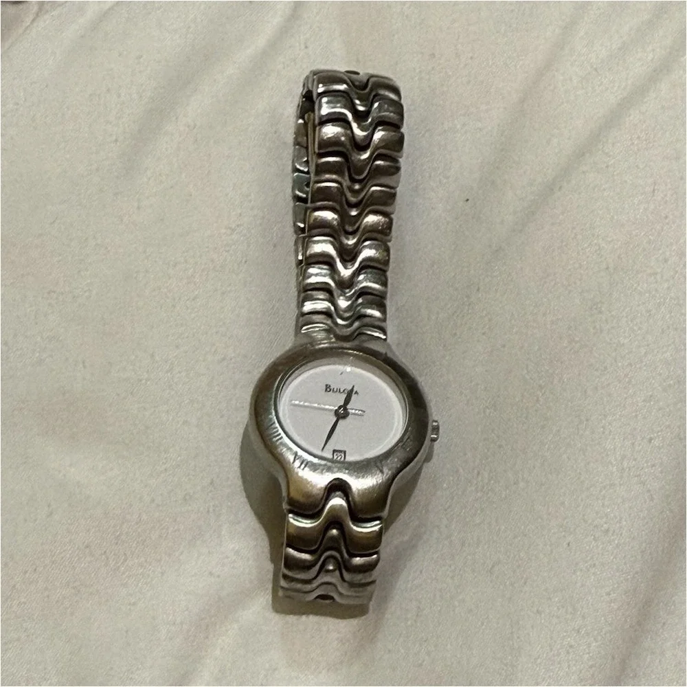 Bulova Women's Stainless Steel Quartz Watch Water-Resistant Date Silver
